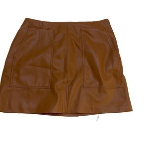 H&M brown faux leather mini skirt 
Size 42